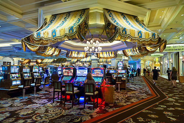 Live dealer at Macau Pools baccarat table with real-time card dealing